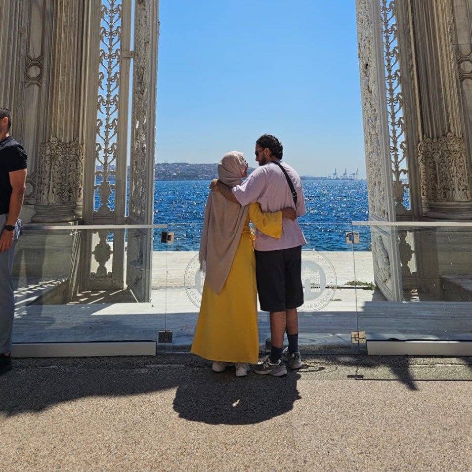 Halima and Ibrahim embracing in front of the Bosphorus, Istanbul